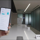 A screenshot of the Motorola YouTube video showing the phone held up and charging